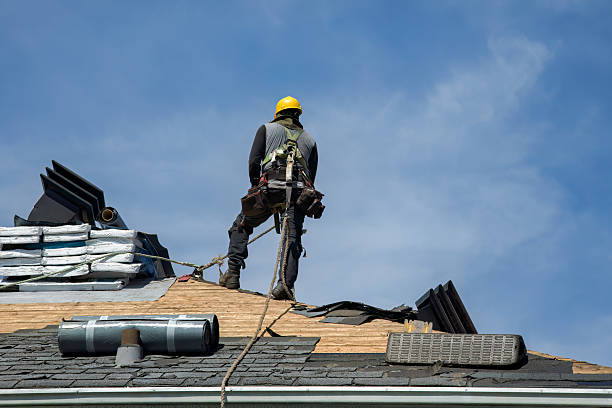 Professional Roofing technician working in Burlington, VT